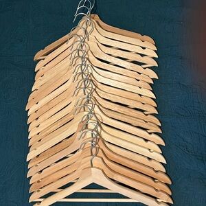 20 wooden hangers, in mint condition.